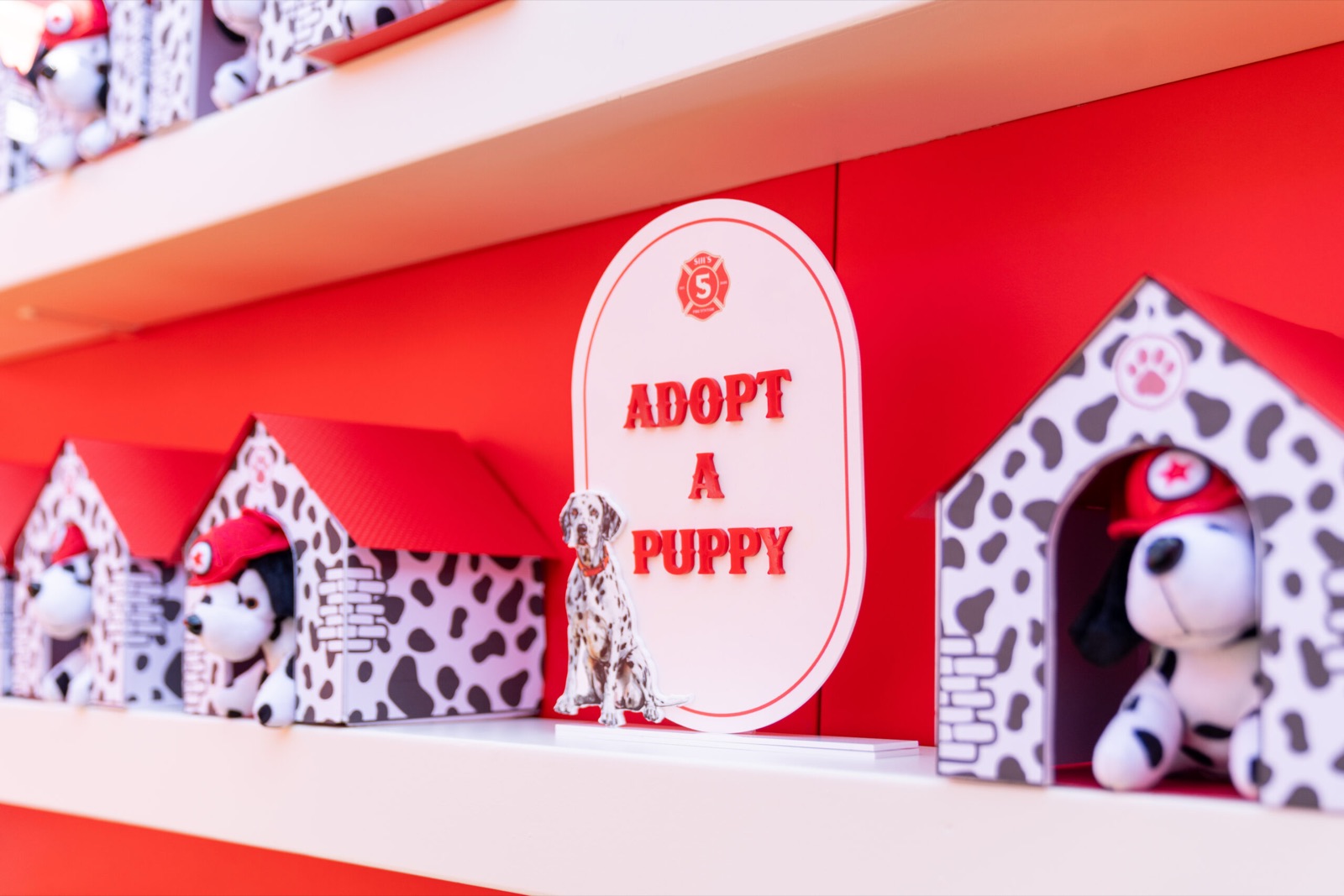 Adopt a puppy corner with plush dalmatians