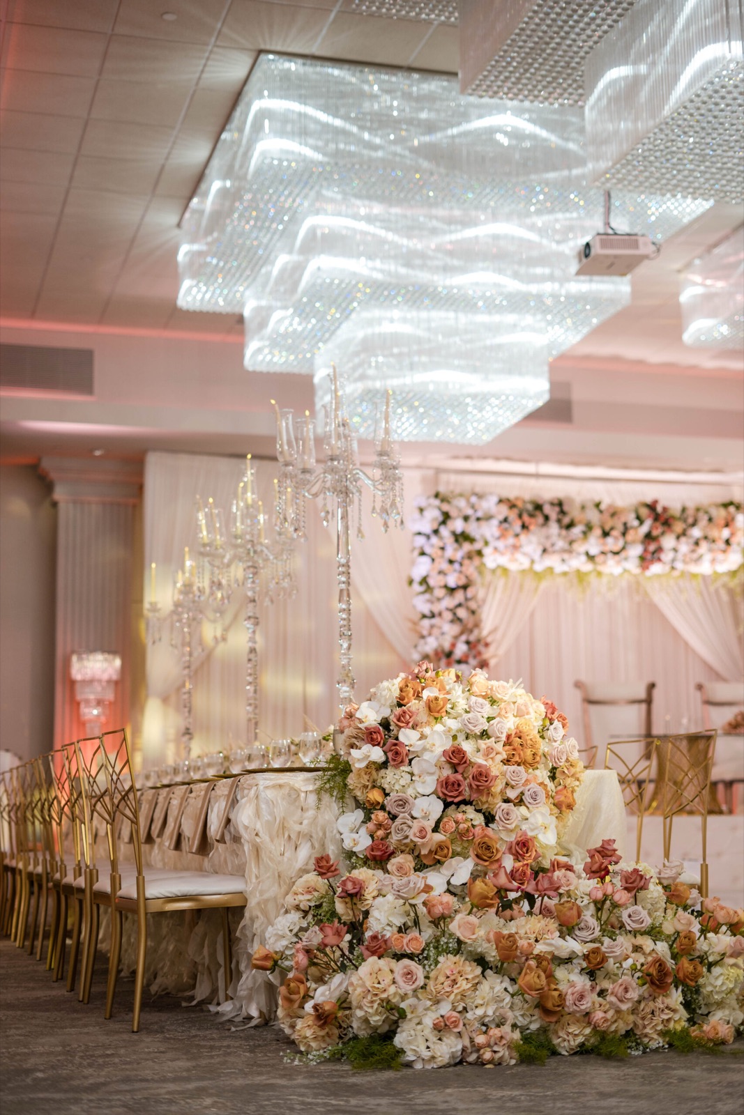 White reception, floral wall